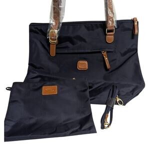 Bricks 3 in one SportinaTravel bag Navy NWT with luggage strap medium 12'x10x6"